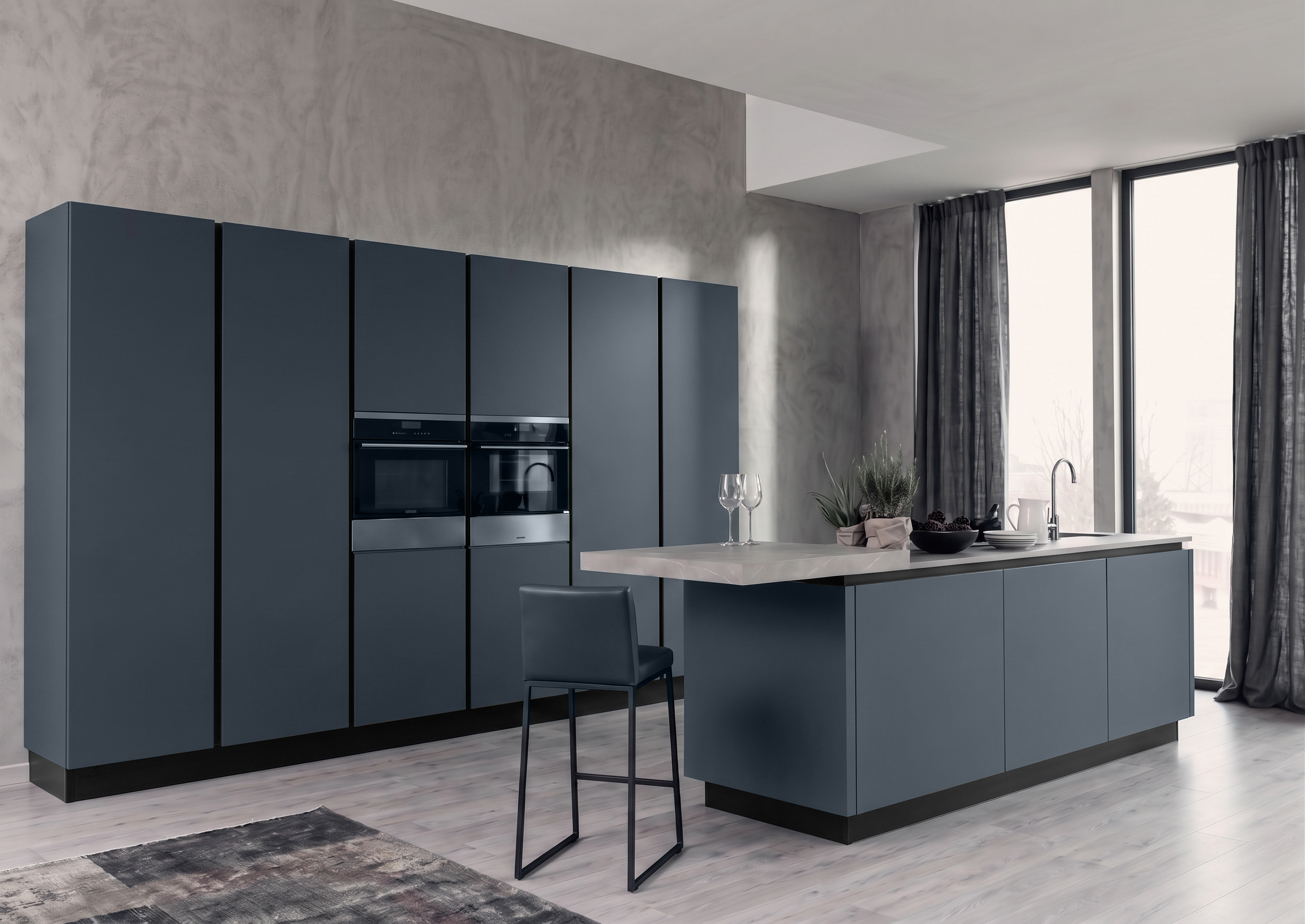 Indigo kitchen system by Gacaferi 1957 — deep matte indigo cabinetry with a pale island